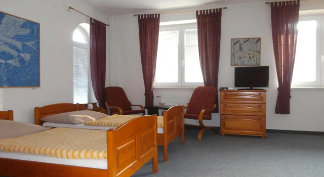 Номер Standard Pension Najdek