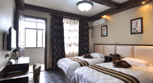 Wuzhen Chenhui impression Theme Inn, Rezerwuj Hotel Wuzhen Jiaxing