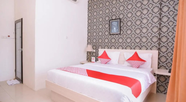 Номер Deluxe Capital O 854 Ub Caisar Hotel