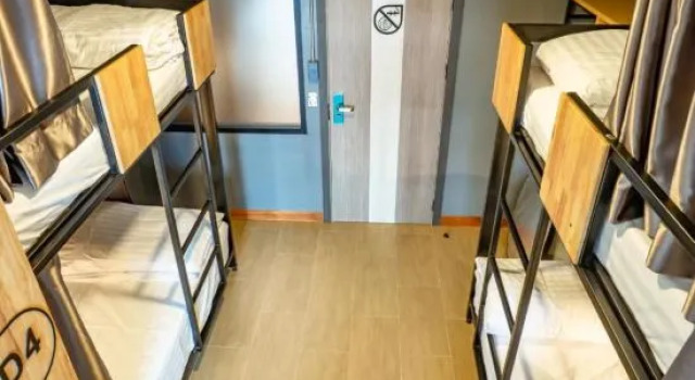 Кровать в общем номере с видом на город Jinjiang Inn Nantong Gongnong Road