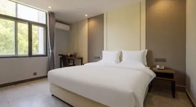 Люкс Deluxe Yuyao Jjiangnanbusiness Hotel