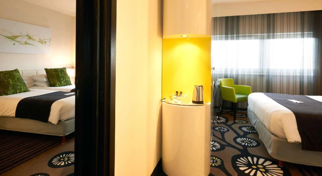 Четырёхместный семейный люкс с 2 комнатами Best Western Plus Hôtel Le Rhénan & Restaurant Chez Claude