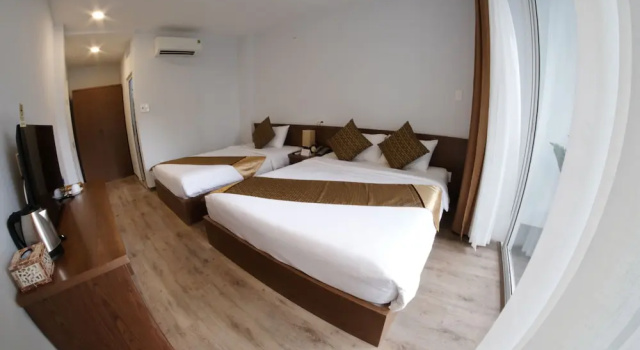 Трёхместный номер Deluxe с балконом The Umi Hotel