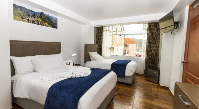 Standardowy czteroosobowy pokój Apart Hotel Cusco