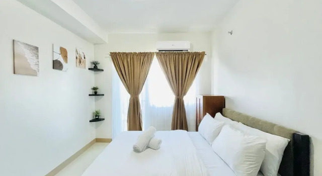Двухместная семейная студия с балконом и с видом на бассейн SMDC Style Residences Studios