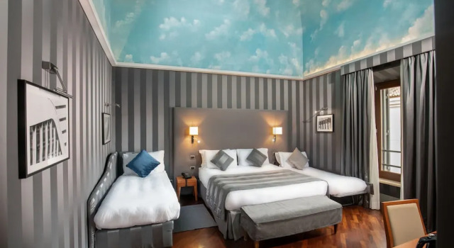 Четырёхместный номер Prestige Monti Palace Hotel