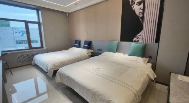 Кровать в общем номере Jiansanjiang Yulin Intelligent Hotel