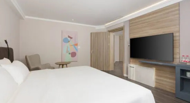 Люкс Deluxe HanTing Hotel (Dalian Zhongshan Jiefang Road)