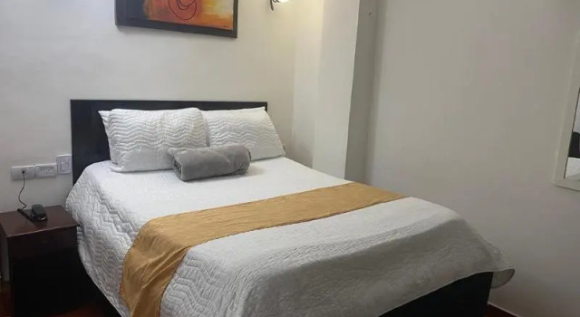Номер Business Hotel Avenida 3 Real en el norte de Cali