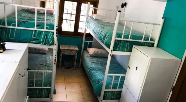 Кровать в общем номере Hostel Punto Patagónico Neuquén