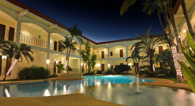 Кровать в общем номере Citystate Asturias Hotel Palawan