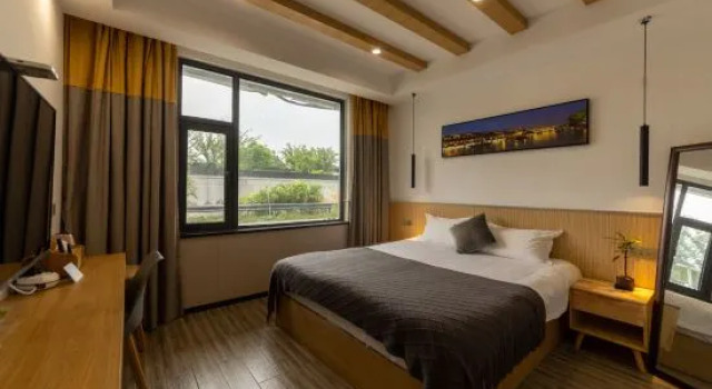 Wuzhen Chenjia Homestay, Забронировать Отель Учжэнь Цзясин