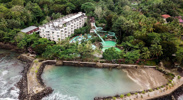 Кровать в общем номере Hawaii Resort Family Suites
