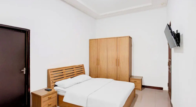 Номер Deluxe Hotel O Balikpapan near Taman Beruang Madu formerly Palm Cafe Inn