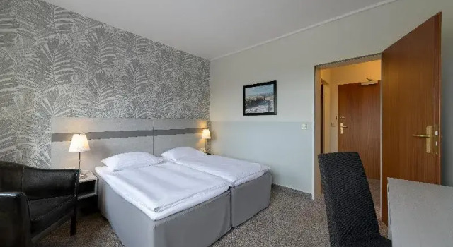 Четырёхместный семейный номер Standard c 1 комнатой Sunday Hotel des Nordens