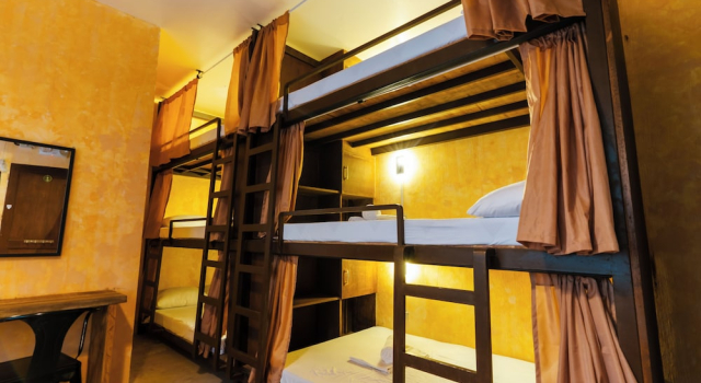 Кровать в общем номере The Shack Hideaway by Mayumi Resorts