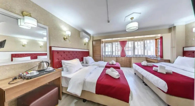 Четырёхместный люкс Family Cihangir Palace Hotel