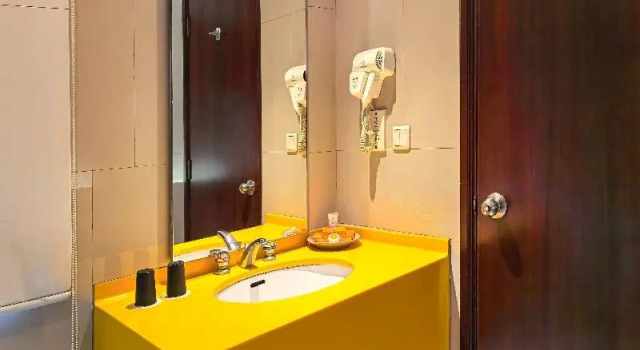 Grandiose chambre Grand Candi Hotel