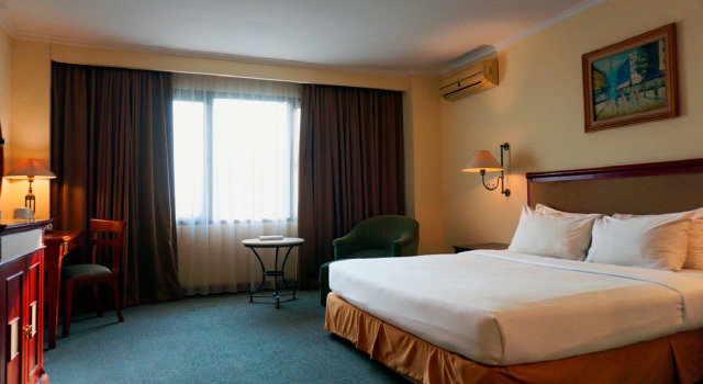Номер Deluxe Mega Anggrek Hotel Jakarta Slipi