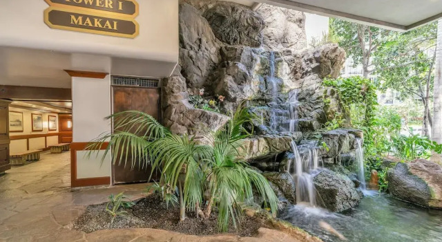 Waikiki Banyan High Level Condo with Ocean Views from the Private Lanai