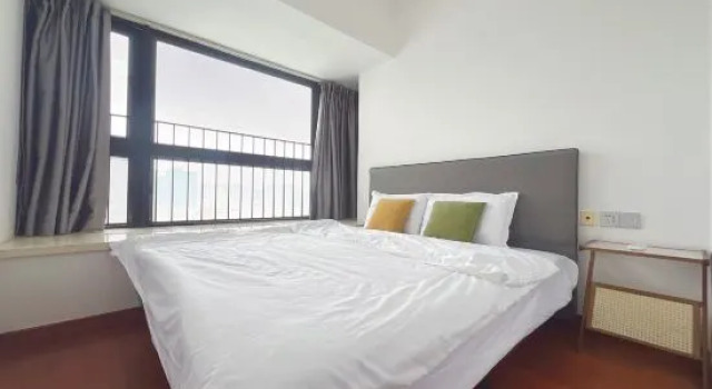 Люкс с балконом Qiannuo Homestay (Foshan New DNA)