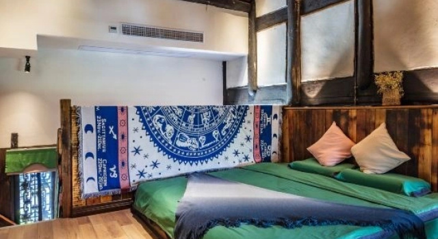 Четырёхместный люкс с видом на внутренний двор Floral Hotel Zhanlin's House