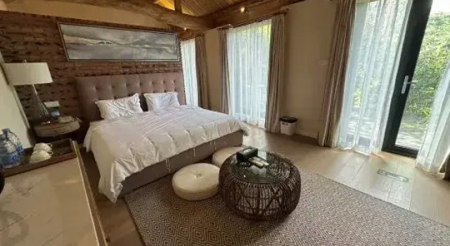 Кровать в общем номере c 1 комнатой Jinta Xiangu Holiday Town