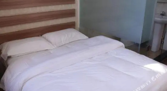 Licheng Sunshina Business Hotel, Varaa Hotelli Daqing Heilongjiang