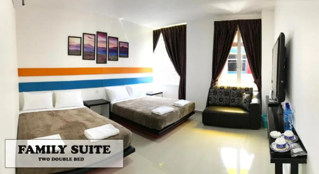 Lüks dört kişilik oda Jerantut Hill Hotel