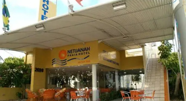 Кровать в общем номере Netuanah Praia Hotel