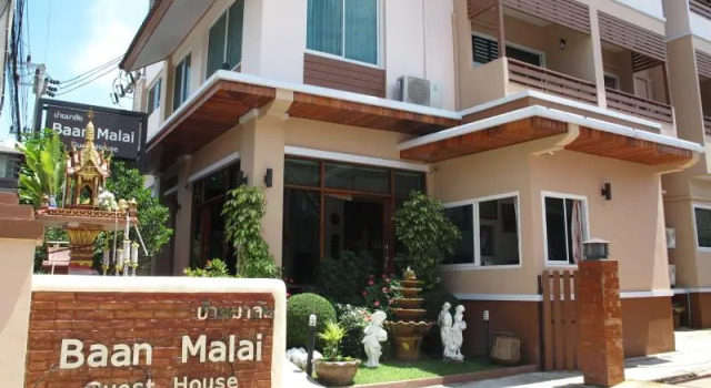 Кровать в общем номере Baanmalai Hotel Chiangrai
