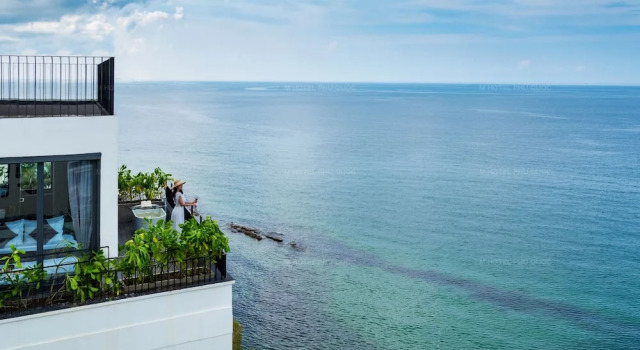 Люкс с балконом и с видом на океан M Hotel Phu Quoc