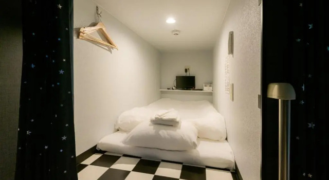 Bett im Wohnheim Hotel Base Nara