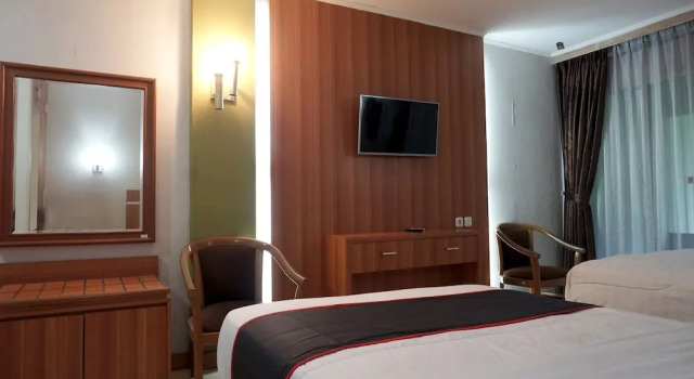Двухместный номер Deluxe Puspiptek Residence Syariah Mitra RedDoorz