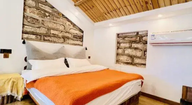 Кровать в общем номере с 6 комнатами с видом на внутренний двор Weizhou Island Dudu's Banhai Homestay (Xijiao Wharf)