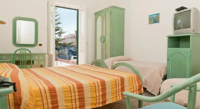 Четырёхместный номер Standard с балконом Hotel Del Postiglione