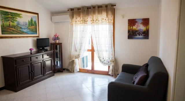 Апартаменты c 1 комнатой с балконом Comfortable Apartment - Quartu - close to Poetto Beach