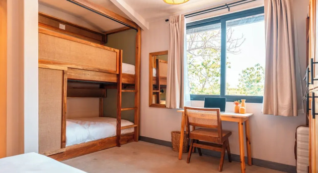 Кровать в общем номере Hotel Bambuda Santa Catalina