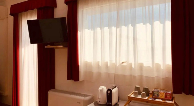 Четырёхместный люкс Hotel Verdi