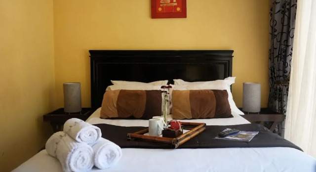 Tuscan Lodge Polokwane, Забронировать Дом для отпуска Коттеджи Полокване, рядом с Polokwane Golf Club, Коттедж