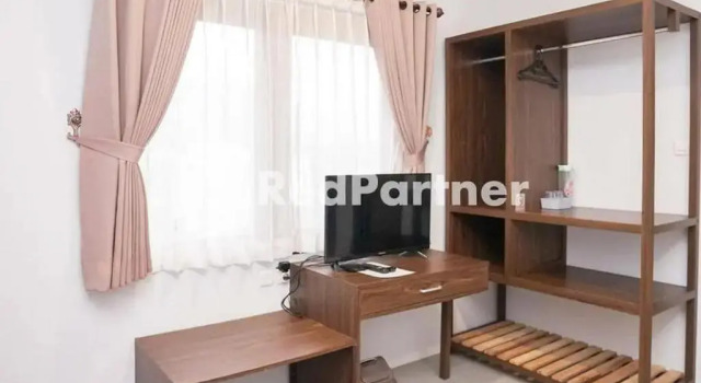 Suite Panorama İnn Residence Batu Mitra RedDoorz