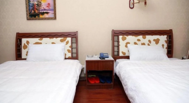 Tianjin Hongyunxin Hotel, Buchen Sie Hotel Binhai Tianjin Area
