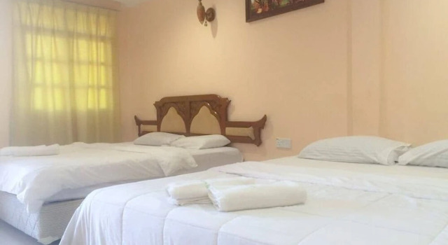Четырёхместный номер Standard Penarak Bamboo Beach Motel