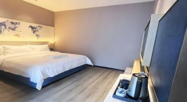 Люкс Deluxe Kyriad Marvelous Hotel  Shenzhen Longgang Central City Weibaisheng Building Branch