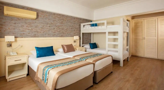 Четырёхместный номер Palmin Hotel
