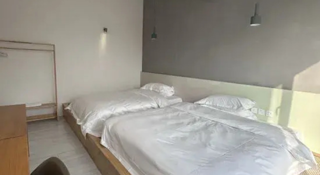 Кровать в общем номере Beijing Catree B&B
