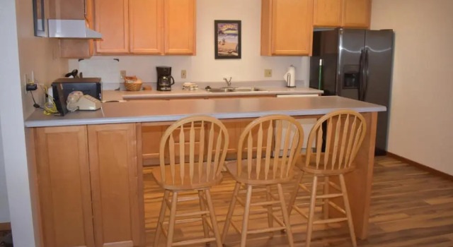 Коттедж с 3 комнатами Coquille Point Condo