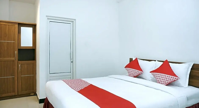 Номер Deluxe Hotel O Pondok Helomi