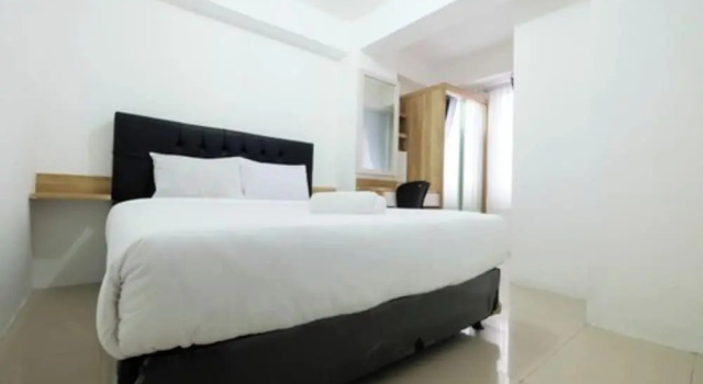 Номер Standard 1BR with Sofa Bed at Bassura City Apartment