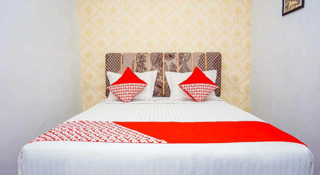 Номер Standard Hotel O Jalan Jenderal Sudirman Near Imam Bonjol Square Formerly Nelvi Guest House